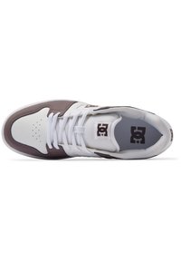 White and brown sneaker with a smooth leather and mesh upper, round toe, perforated details, flat laces, and cushioned ankle collar.