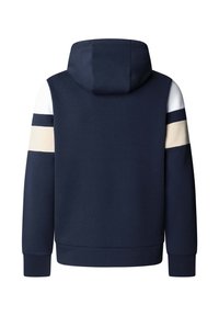 Tmavomodrá mikina s kapucňou s bielymi a béžovými farebnými blokmi na horných rukávoch, rebrovanými manžetami a pásom, zobrazená zozadu.
