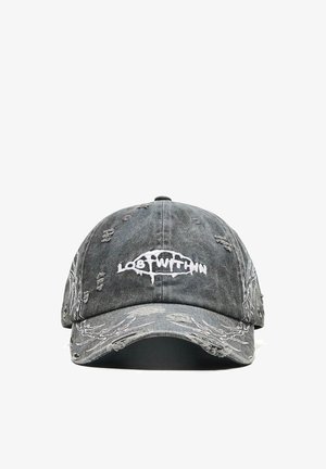 Worn black baseball cap with distressed details and white embroidered text "Lost Within" on front and abstract white stitching on sides and brim.