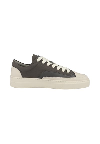 Low-top sneaker with dark gray fabric upper, white leather toe cap, heel, laces, and thick white rubber sole.