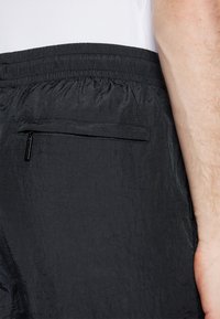 Sergio Tacchini NAYLA - Tréningruha alsók - black/gardenia
