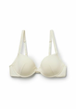 Soutien-gorge à armatures couleur crème avec bretelles ajustables et tissu subtilement texturé, présenté sur un fond blanc.