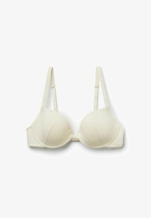 Soutien-gorge à armatures couleur crème avec bretelles ajustables et tissu subtilement texturé, présenté sur un fond blanc.