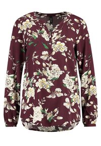 Blouse bordeaux à manches longues avec un motif floral blanc et vert, devant boutonné et ourlet arrondi. Tissu doux avec une coupe décontractée.