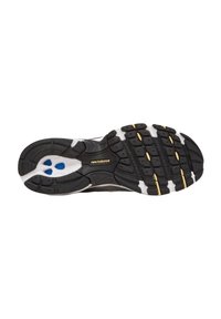 Suela de zapato atlético negro con patrones de tracción multidireccional, acentos blancos, inserción de goma azul y detalles de marca en dorado.