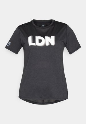 Short-sleeve black t-shirt made of textured fabric. Features bold white "LDN" print on the front and a small logo on the left sleeve.