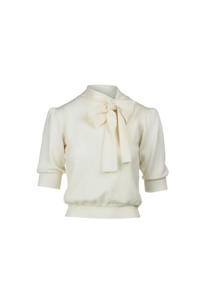 White knit sweater with short puff sleeves, loose fit, and a bow detail at the neck. Textured fabric with ribbed cuffs and hem.