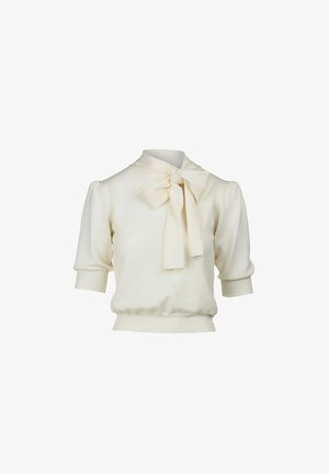 Maglione bianco a maglia con maniche corte a pompon, vestibilità morbida e un dettaglio a fiocco sul colletto. Tessuto testurizzato con polsini e orlo a coste.