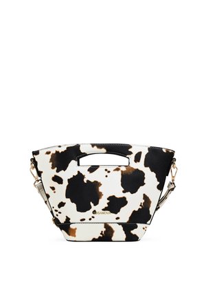 Pequeño bolso trapezoidal con estampado de vaca en negro, blanco y marrón, asa recortada en la parte superior, correa desmontable y logo dorado "BOSANOVA" en el frente.