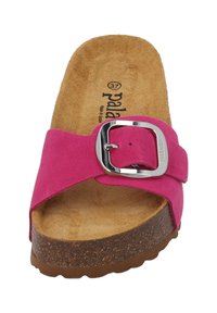 Sandale à glissière en suede fuchsia avec une large sangle, boucle en argent et semelle en liège. Semelle extérieure texturée marron. Taille 37.