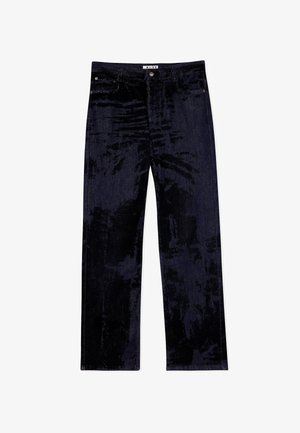 Tumedast sinisest sametist teksad sirge säärega disainiga, millel on esipockets ja kontrastne riistvara aktsent vöökohal.