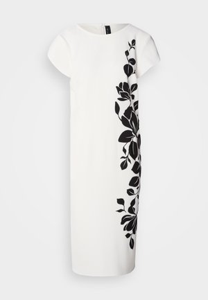 White dress with short sleeves, featuring a black floral design on one side. Soft texture, knee-length cut, clean lines, and back zipper.