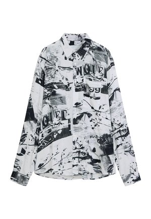 Long-sleeve shirt featuring a black and white abstract pattern, made of lightweight fabric, with a button-down front and chest pocket.