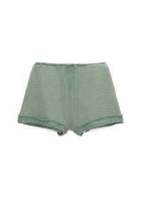 Shorts en coton vert clair texturé avec une taille élastique et un cordon de serrage à l'avant, présentés sur un fond blanc.