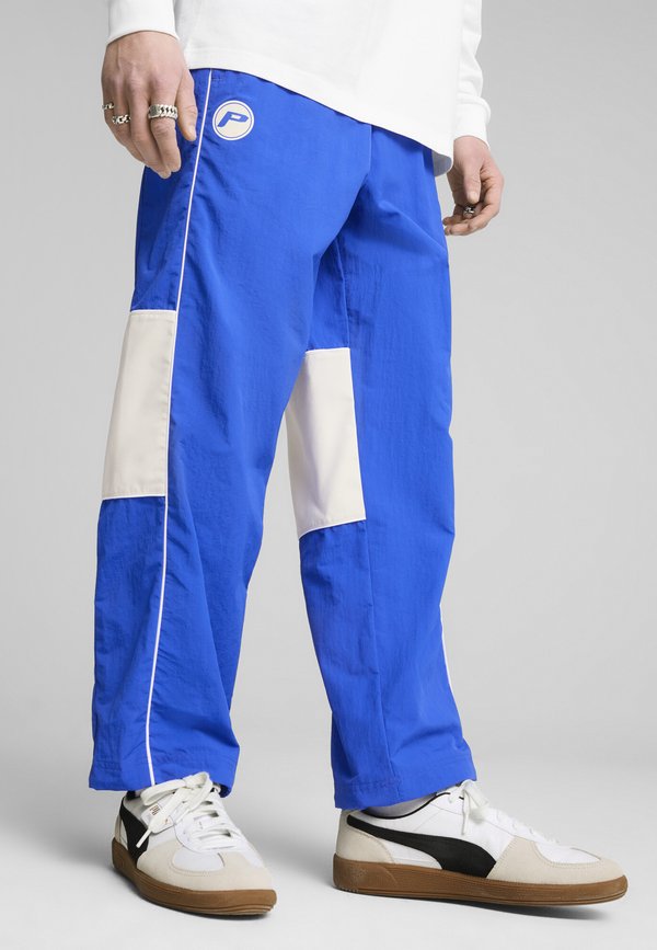 SDS RELAXED GRAPHIC TRACK PANTS UNISEX - Jogginghose - team royal