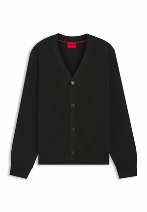 Cardigan nero in trama a coste con scollo a V, dotato di chiusura anteriore con bottoni e polsini solidi. Dettaglio del logo sul lato inferiore.