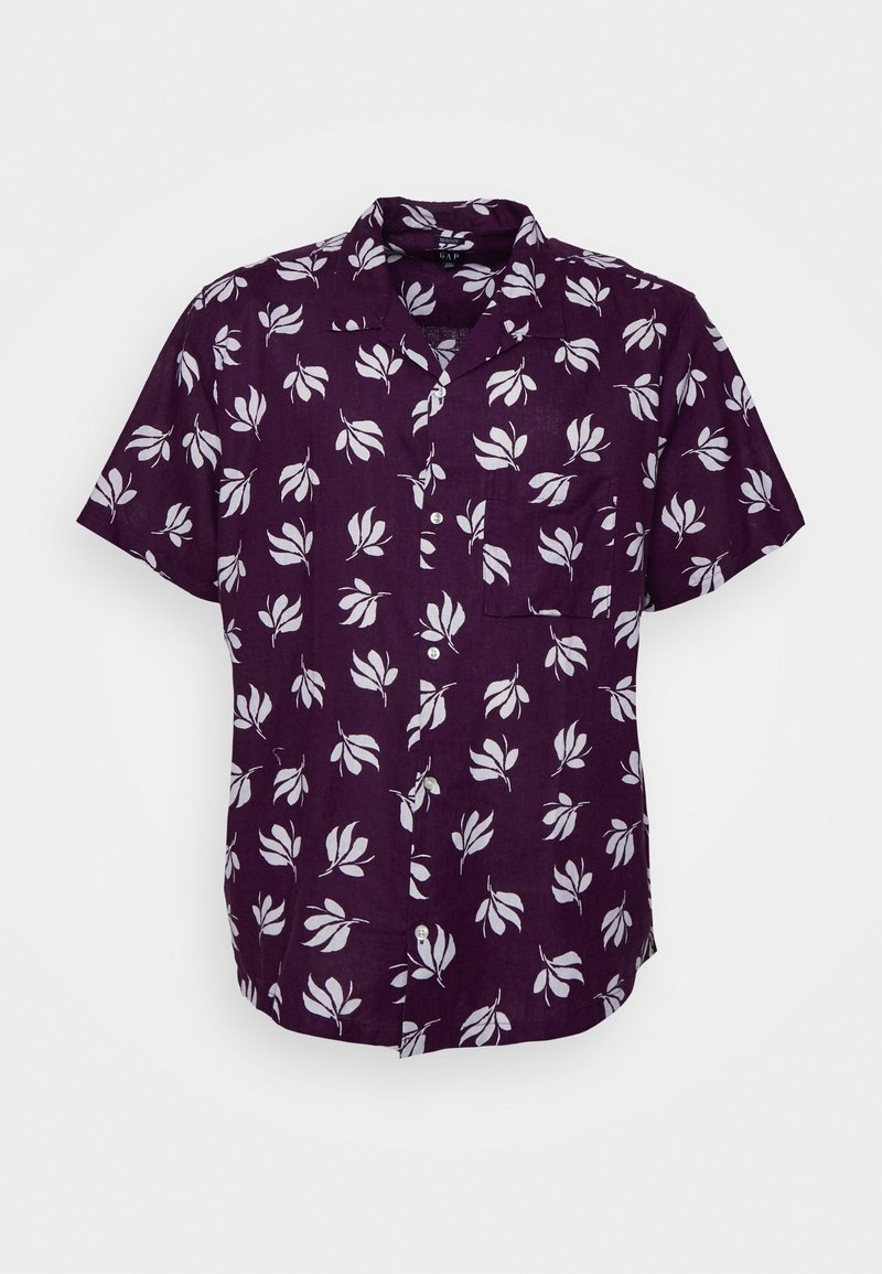 Camicia a maniche corte di colore viola con motivo a foglie bianche e taschino sul lato sinistro.