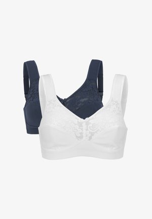 Deux soutiens-gorge : l'un marine avec des détails en dentelle et des bretelles ajustables, l'autre blanc avec un overlay en dentelle et un design sans coutures.