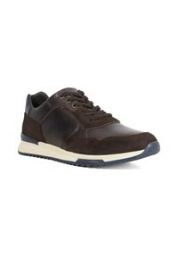 Dark brown athletic shoe made of leather and suede, featuring a rounded toe, lace-up design, and contrasting white midsole with a textured rubber sole.