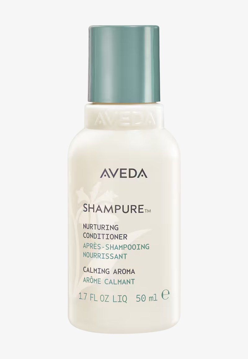 Flacon d'après-shampoing nourrissant Aveda Shampure avec un arôme apaisant, 50 ml, crème pâle avec bouchon vert et motif floral.