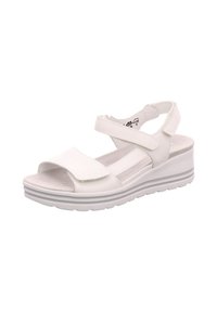 White wedge sandal with adjustable straps, soft insole, and a textured rubber sole. Features a smooth upper and minimalistic design.