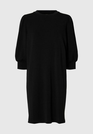 Mustmust, põlvepikkune kleit lühikeste puhvvarrukatega, ümar dekoltee, valmistatud pehmest kangast. Lihtne, ühtlane värv ilma mustrite või kaunistusteta.