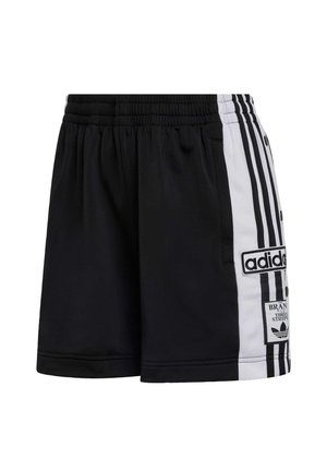 Musta urheiluhousut, joissa on valkoiset sivupaneelit, kolme pystysuoraa raitaa, kirjailtu logo ja nepparikiinnitteiset yksityiskohdat.