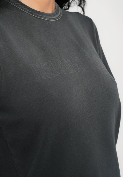 Gray cotton T-shirt with a crew neck, featuring a subtle embossed brand logo on the front. Smooth texture and relaxed fit.