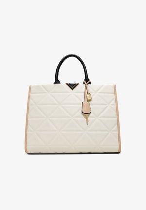 Quilted white handbag with black handles, gold accents, and a detachable keychain. Features a structured design and beige trim.