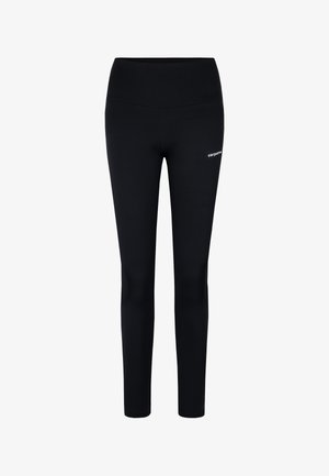 Mustad mustrid, valmistatud venivast kangast, kõrge vöökoha ja väikese logoga vasakul reiel, loodud mugavuseks ja liikuvuseks.