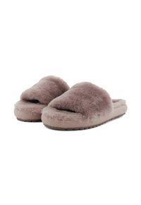 Pantofole pelose con parte superiore in morbido pellicciotto taupe, open toe e suola in gomma robusta. Presentano una soletta imbottita per un comfort ottimale.