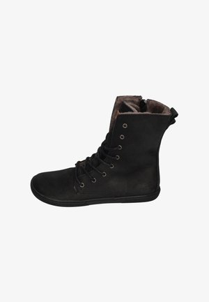 Black leather ankle boot with side zipper, lace-up front, round toe, textured surface, and plush interior lining for added warmth.