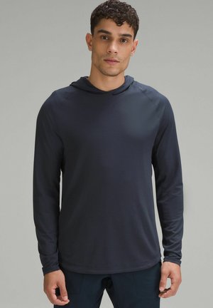 LICENSE TO TRAIN - Jersey con capucha - true navy