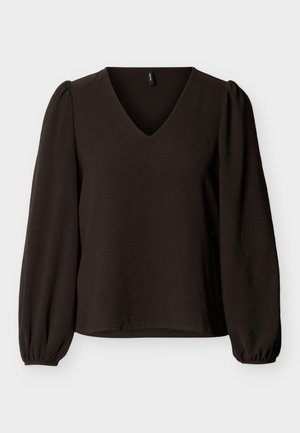 Blusa negra de manga larga con cuello en V, hombros abullonados y puños elásticos, presentada sobre un fondo claro y liso.