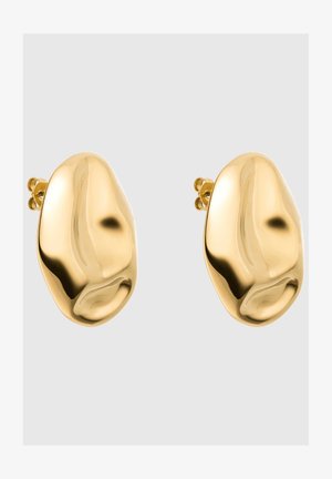 Boucles d'oreilles en métal doré avec une forme organique et arrondie, et une finition polie. Présente une texture discrète en forme de vague sur la surface.
