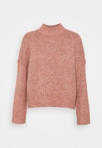 Pull rose tricoté avec un col montant, des manches longues et un ourlet côtelé. La texture est épaisse avec un motif moucheté partout.