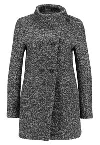 Abrigo de doble faz en tejido de espiga gris oscuro. Cuello alto, mangas largas y dos grandes botones en la parte delantera. Diseño texturizado y cálido.