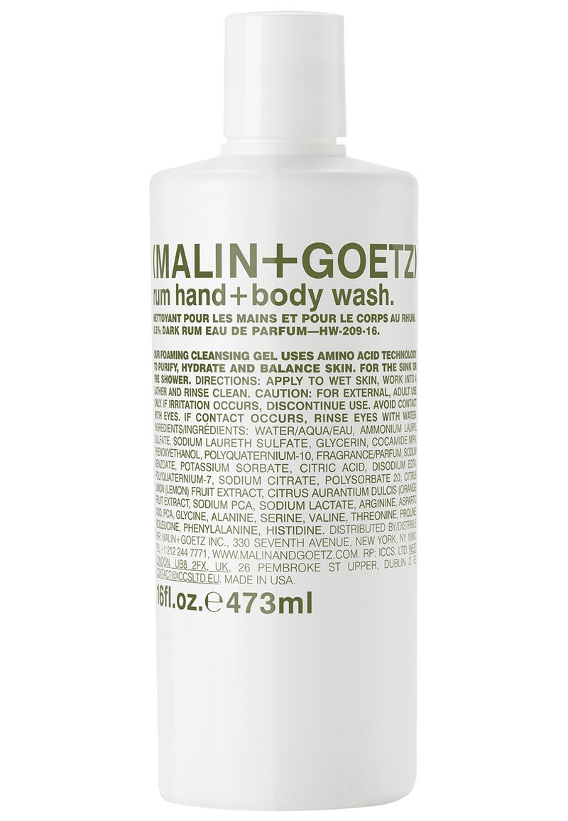 Weiße Flasche mit runder Form, mit grüner Schrift. Enthält 473 ml Rum Hand- und Körperwaschmittel. Einfaches Design, aus Kunststoffmaterial.