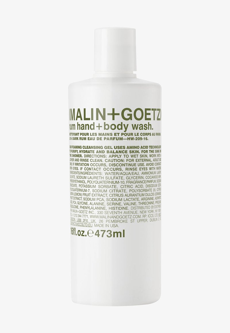 Weiße Flasche mit runder Form, mit grüner Schrift. Enthält 473 ml Rum Hand- und Körperwaschmittel. Einfaches Design, aus Kunststoffmaterial.