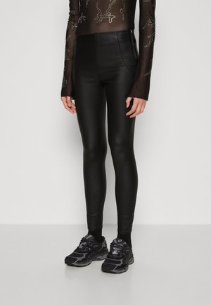 ONLY ONLKEIRA-ROCK LIFE COATED - Leggings - Trousers - black