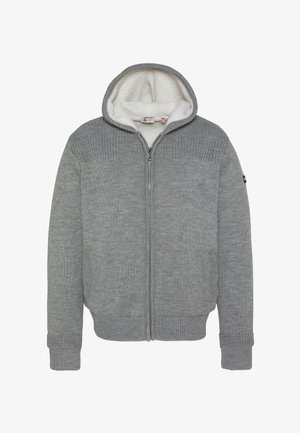 Grauer Kapuzenpullover mit Reißverschluss, innen mit Fleece gefüttert, gestrickter Textur, gerippten Bündchen und Kapuze. Mit kleinem Logo am linken Ärmel.