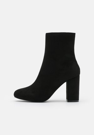 Stivaletti con tacco - black