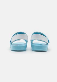 Calvin Klein Jeans NICO UNISEX - Sandaalit nilkkaremmillä - sky blue/white
