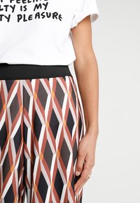 River Island Tygbyxor - orange