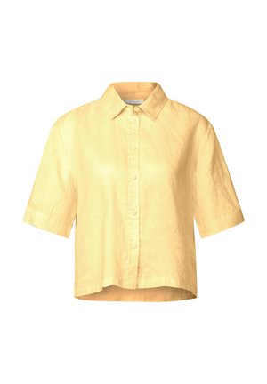 Chemise en lin jaune à manches courtes, boutonnée, avec un col, un ourlet droit et une coupe légèrement oversize. Texture lisse et détails minimalistes.
