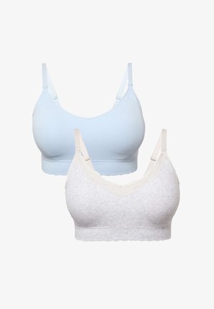 Zwei Still-BHs mit weichen Körbchen, einer hellblau gerippt und einer hellgrau mit Spitzenbesatz, beide mit verstellbaren Trägern und ohne Bügel.