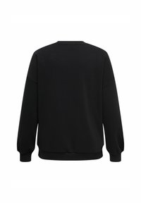 Vienkārša melna garām piedurknēm svītrota krekliņa ar ribotām piedurknēm, apakšmalu un kaklu, parādīta no aizmugures uz balta fona.