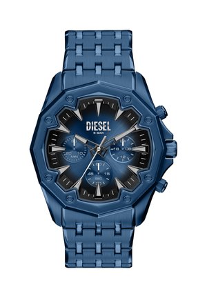 Blåt ur i rustfrit stål med en ottekantet kasse, sort og blå urskive, tre underskiver og lænke i metal. Har mærket "DIESEL."