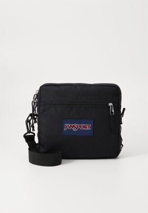 Schwarze Stoff-Umhängetasche mit strapazierfähigem Tragegurt, Reißverschluss, Jansport-Logo-Patch und detaillierter Naht entlang der Kanten.