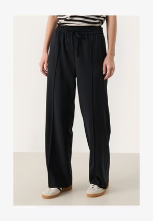 Black wide-leg trousers made of lightweight fabric, featuring an elastic waistband with a drawstring and side pleats.